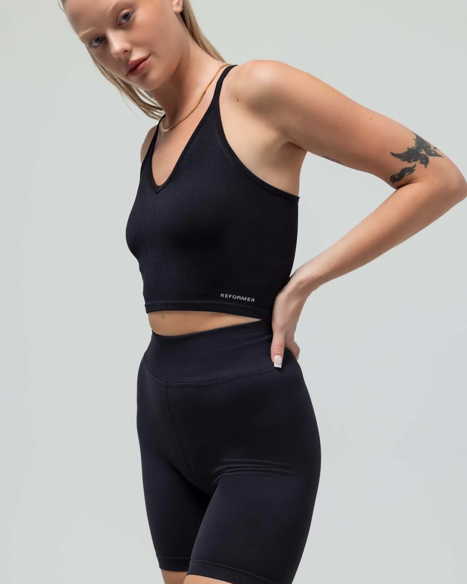 THE CROP RACERBACK V-NECK TANK TOP